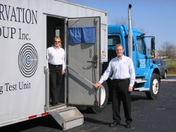 Technician team with mobile testing unit