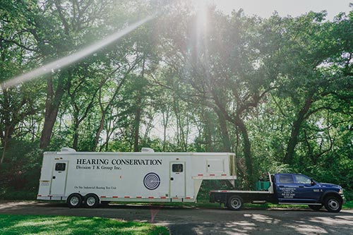 Hearing testing mobile unit in wooded area